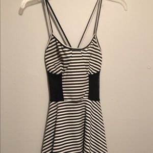 Small. Black and white dress. Cut out